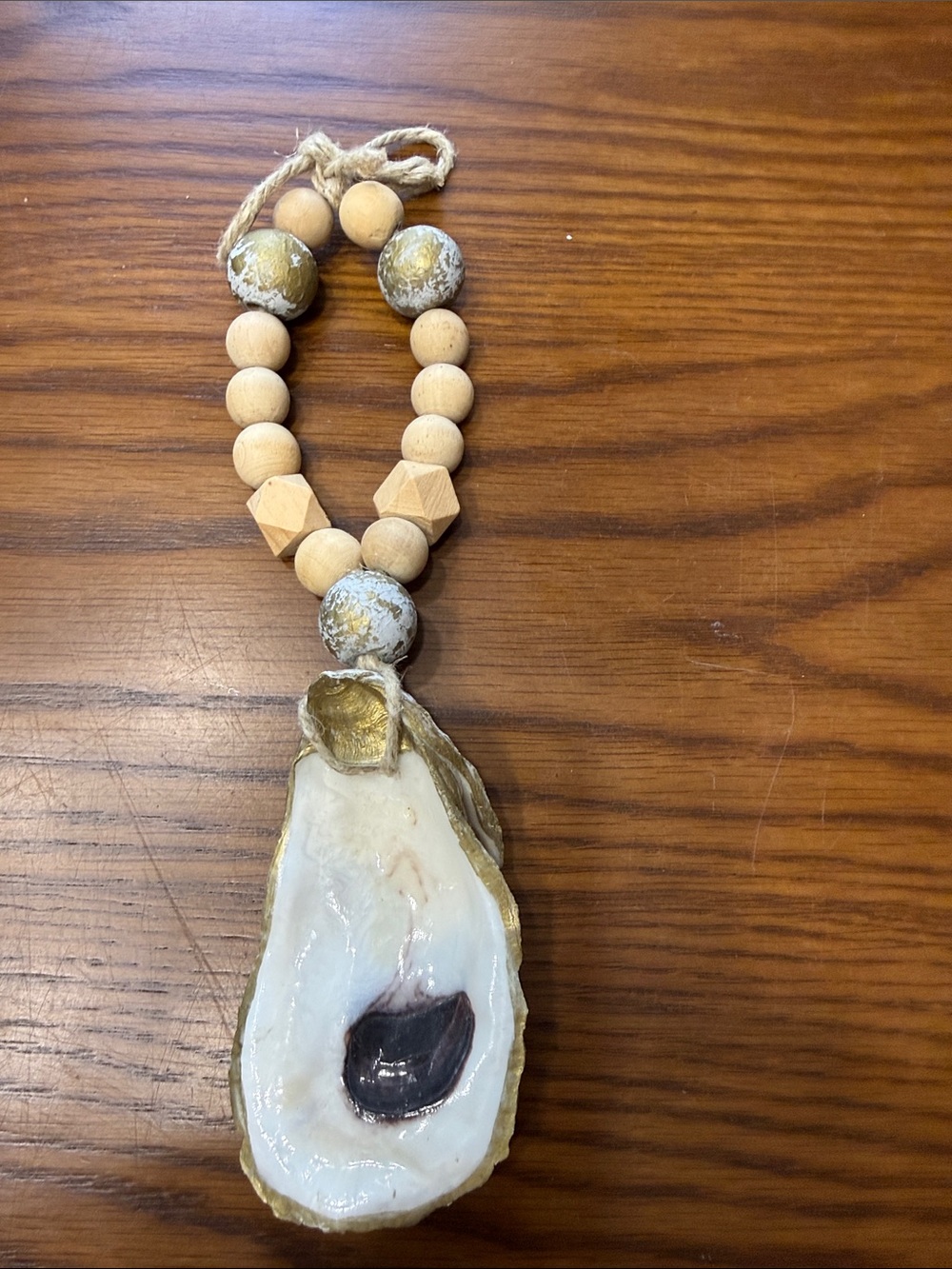 Handmade Coastal Oyster Shell
Ornament are hanging decor piece